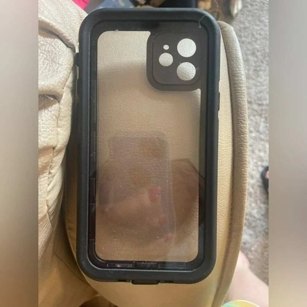 IPhone 12 case black in color good condition